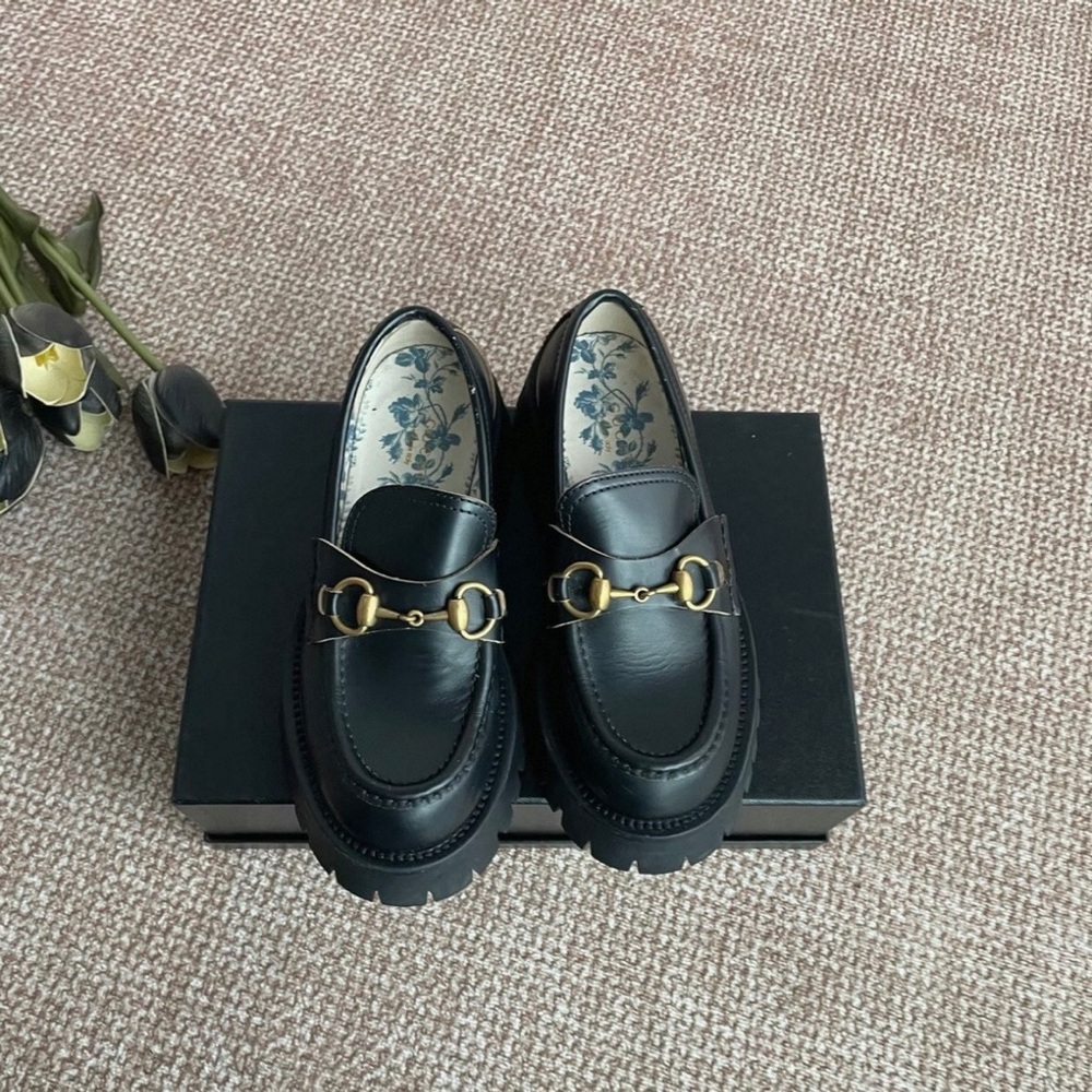 Gucci Black Loafers with Gold Hardware